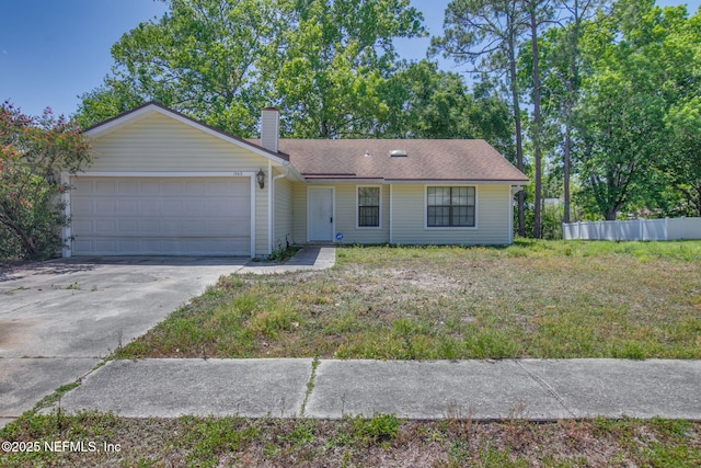 1742 Tiffany Pines Cir E, Jacksonville, FL 32225 - ranch-style house with concrete driveway, an attached garage, fence, and a chimney