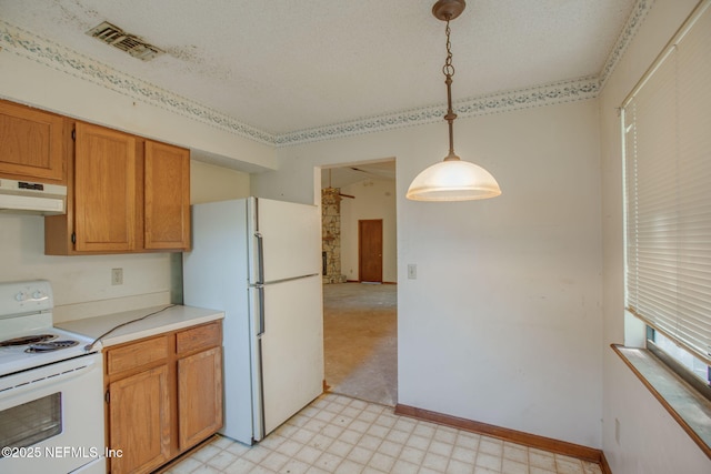 1742 Tiffany Pines Cir E, Jacksonville, FL 32225 - kitchen featuring hanging light fixtures, white appliances, light countertops, under cabinet range hood, and visible vents
