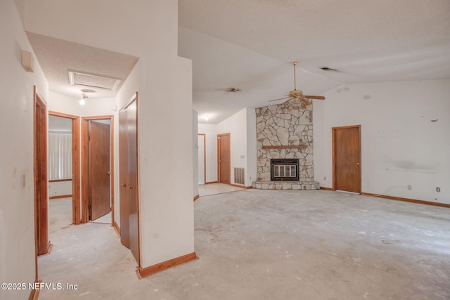 1742 Tiffany Pines Cir E, Jacksonville, FL 32225 - unfurnished living room featuring ceiling fan, a fireplace, baseboards, vaulted ceiling, and visible vents