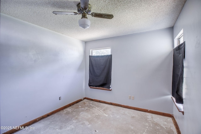 1742 Tiffany Pines Cir E, Jacksonville, FL 32225 - empty room with baseboards, concrete flooring, and a wealth of natural light