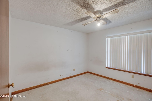 1742 Tiffany Pines Cir E, Jacksonville, FL 32225 - spare room with unfinished concrete floors, baseboards, a ceiling fan, and a textured ceiling