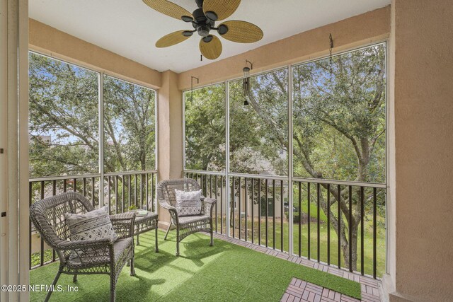 8601 Beach Blvd Unit 323, Jacksonville, FL 32216 - sunroom featuring ceiling fan