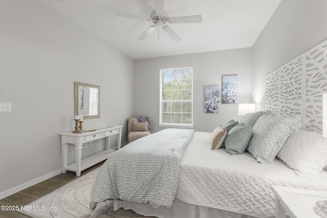 8601 Beach Blvd Unit 323, Jacksonville, FL 32216 - bedroom featuring baseboards, ceiling fan, and wood finished floors