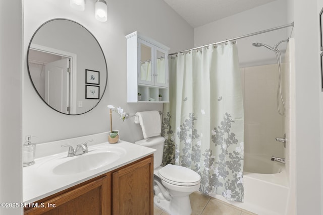 8601 Beach Blvd Unit 323, Jacksonville, FL 32216 - bathroom with tile patterned floors, shower / bathtub combination with curtain, vanity, and toilet