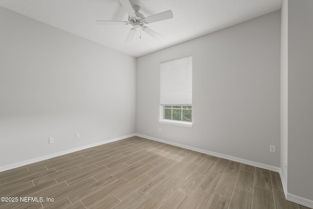 8601 Beach Blvd Unit 323, Jacksonville, FL 32216 - empty room with baseboards, a ceiling fan, and wood finished floors