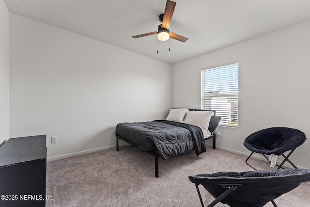bedroom with carpet floors, baseboards, and ceiling fan