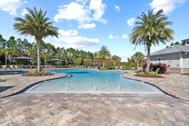 community pool with a patio
