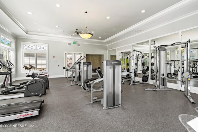 workout area with crown molding, visible vents, baseboards, recessed lighting, and a tray ceiling