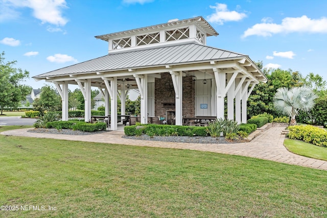 view of home's community featuring a lawn and a gazebo