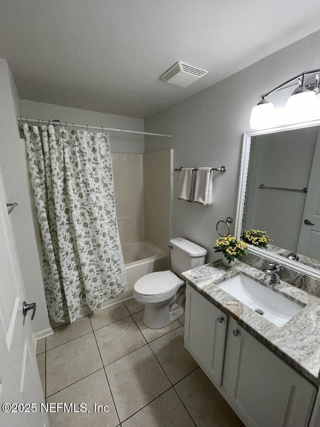 4000 Grande Vista Blvd Unit 15-102, Saint Augustine, FL 32084 - bathroom featuring vanity, tile patterned flooring, shower / bath combination with curtain, and toilet