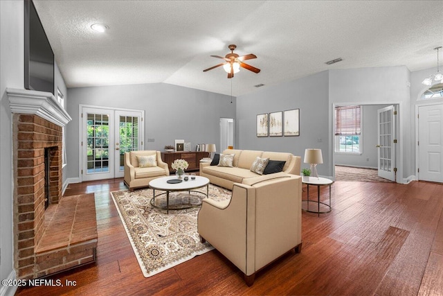 1800 Norway Dr, Fleming Island, FL 32003 - living room with french doors, ceiling fan, wood finished floors, a textured ceiling, and baseboards