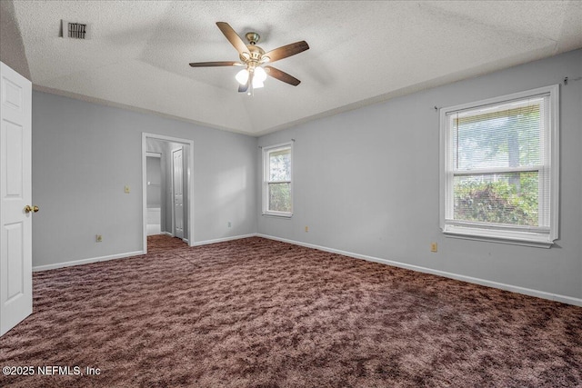 1800 Norway Dr, Fleming Island, FL 32003 - unfurnished bedroom with a textured ceiling, carpet floors, baseboards, and ceiling fan