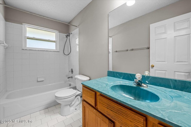 1800 Norway Dr, Fleming Island, FL 32003 - full bathroom with a textured ceiling, toilet, tile patterned flooring, bathtub / shower combination, and vanity