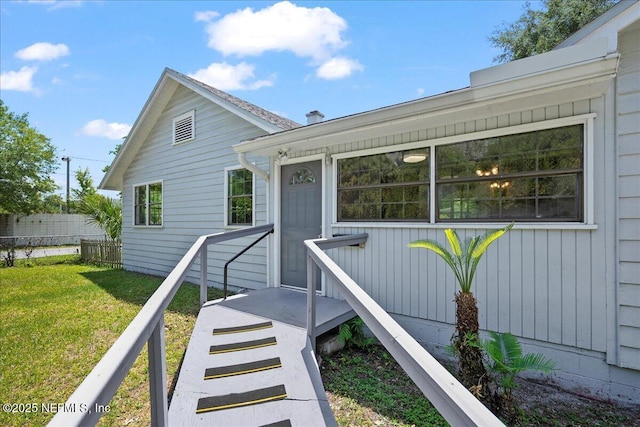 5104 Hollycrest Dr, Jacksonville, FL 32205 - view of front facade with fence and a front yard