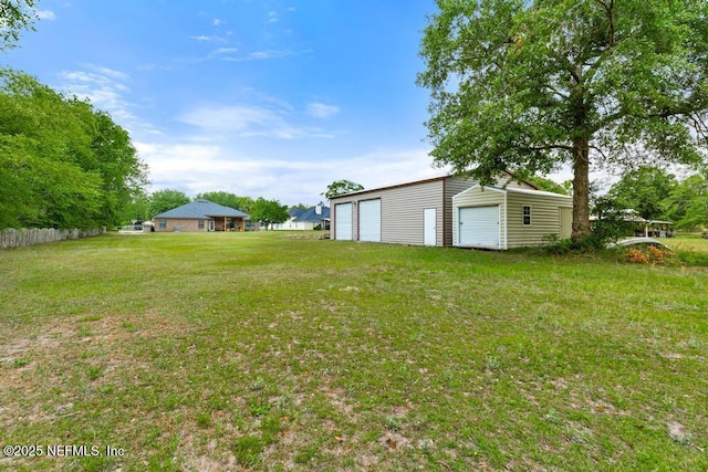 32238 Settlers Ridge Dr, Bryceville, FL 32009 - view of yard featuring a garage and an outbuilding