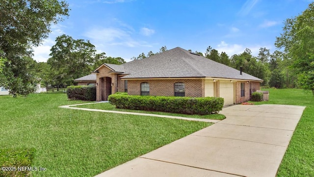 32238 Settlers Ridge Dr, Bryceville, FL 32009 - view of front of home featuring brick siding, a garage, a front lawn, concrete driveway, and a shingled roof