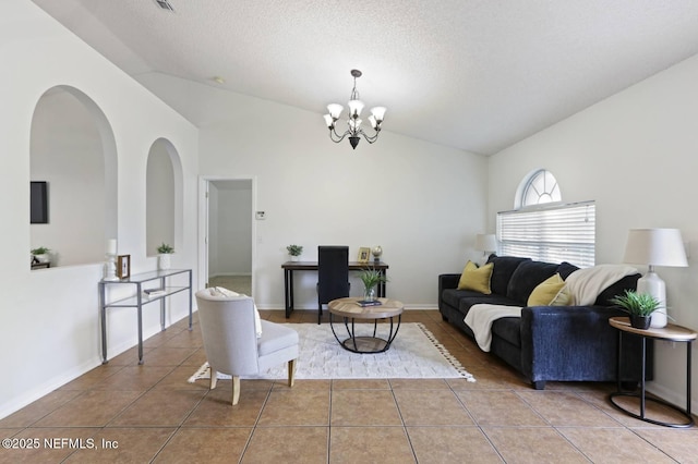12394 Glenn Hollow Dr, Jacksonville, FL 32226 - tiled living room with lofted ceiling, a chandelier, arched walkways, and a textured ceiling