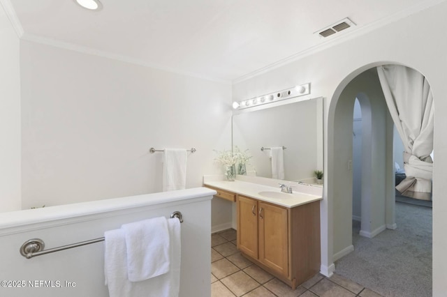 12394 Glenn Hollow Dr, Jacksonville, FL 32226 - bathroom featuring vanity, tile patterned flooring, ornamental molding, and baseboards