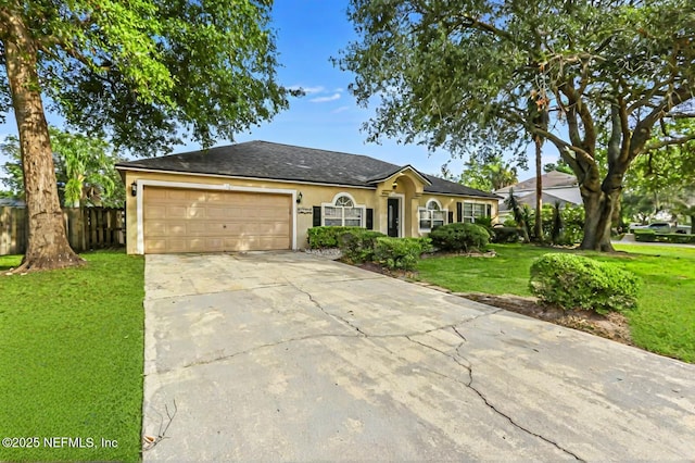 12394 Glenn Hollow Dr, Jacksonville, FL 32226 - ranch-style house with stucco siding, an attached garage, and driveway