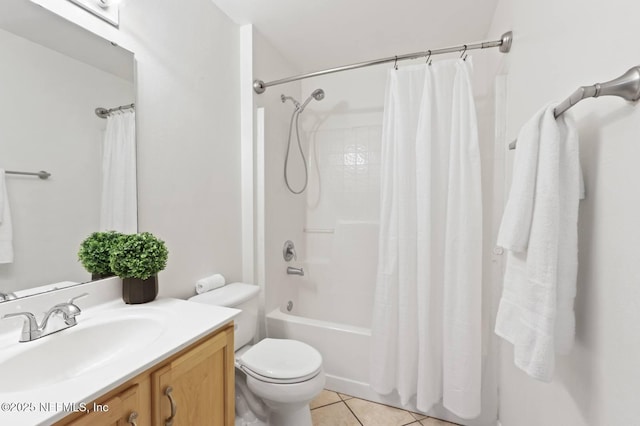 12394 Glenn Hollow Dr, Jacksonville, FL 32226 - bathroom featuring vanity, toilet, tile patterned floors, and shower / bath combo with shower curtain