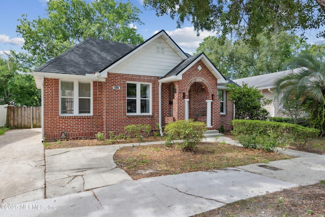 4534 College St, Jacksonville, FL 32205 - view of front of home featuring brick siding and a shingled roof