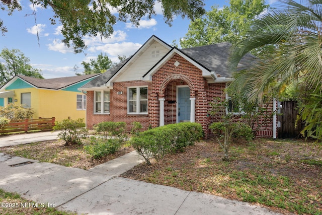 4534 College St, Jacksonville, FL 32205 - view of front of home featuring brick siding and roof with shingles