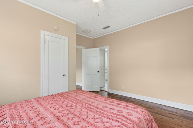 4534 College St, Jacksonville, FL 32205 - bedroom featuring dark wood-type flooring, baseboards, ornamental molding, a textured ceiling, and a ceiling fan