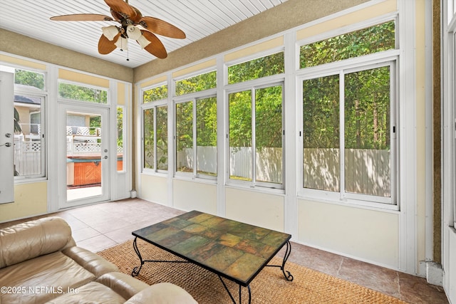 766 Candlebark Dr, Jacksonville, FL 32225 - sunroom featuring ceiling fan and tile patterned floors