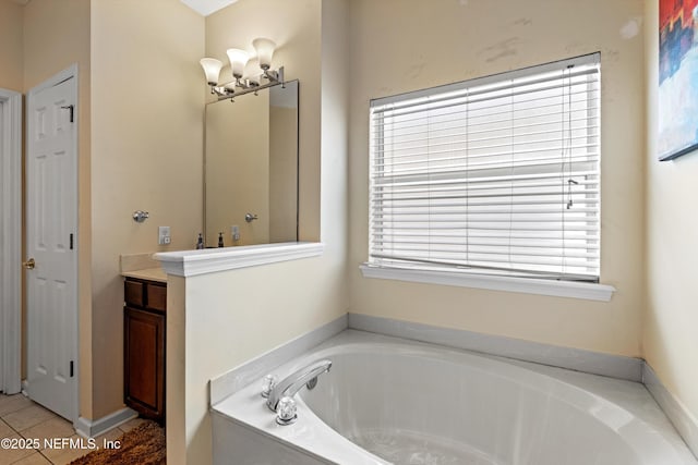 766 Candlebark Dr, Jacksonville, FL 32225 - bathroom with a garden tub, plenty of natural light, vanity, and tile patterned floors