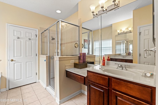 766 Candlebark Dr, Jacksonville, FL 32225 - full bath with tile patterned floors, a shower stall, vanity, and baseboards