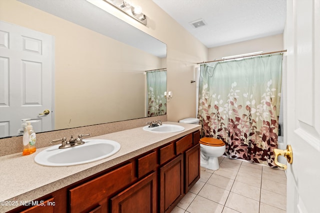 766 Candlebark Dr, Jacksonville, FL 32225 - full bathroom featuring toilet, tile patterned floors, and double vanity