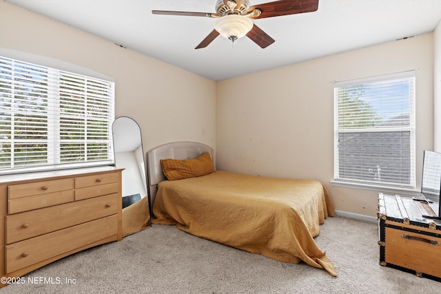 766 Candlebark Dr, Jacksonville, FL 32225 - bedroom featuring light colored carpet, baseboards, and a ceiling fan