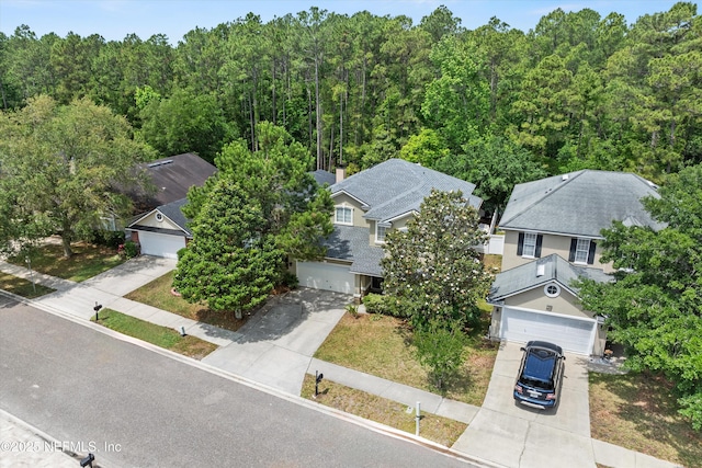 766 Candlebark Dr, Jacksonville, FL 32225 - aerial view of property and surrounding area with a forest