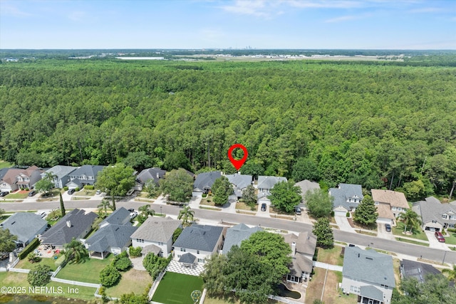 766 Candlebark Dr, Jacksonville, FL 32225 - aerial view of property and surrounding area featuring a heavily wooded area and nearby suburban area
