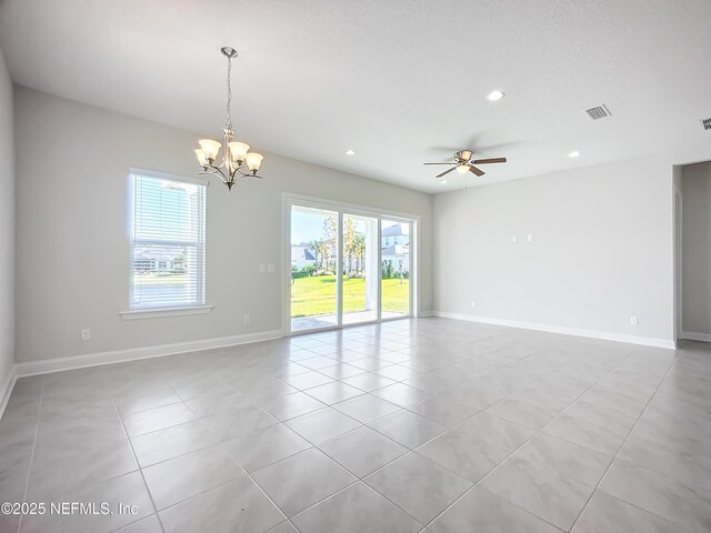 232 Caiden Dr, Ponte Vedra, FL 32081 - spare room with recessed lighting, baseboards, light tile patterned floors, and ceiling fan with notable chandelier