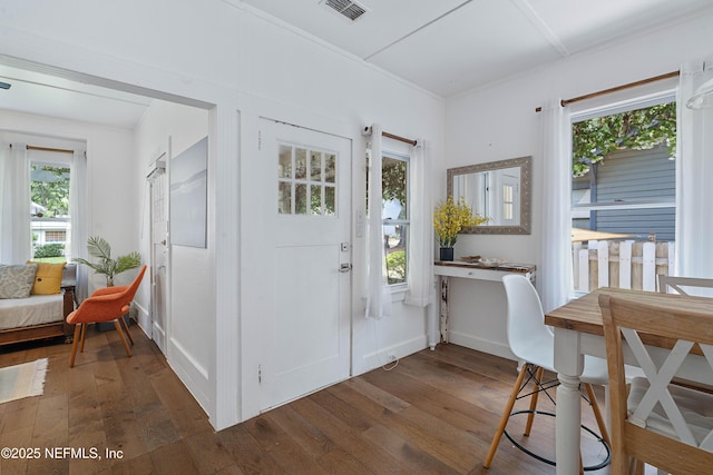 2720 Apache Ave, Jacksonville, FL 32210 - foyer featuring baseboards, wood-type flooring, and visible vents