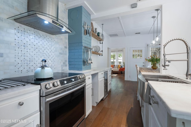 2720 Apache Ave, Jacksonville, FL 32210 - kitchen featuring backsplash, electric range, open shelves, coffered ceiling, and wall chimney exhaust hood