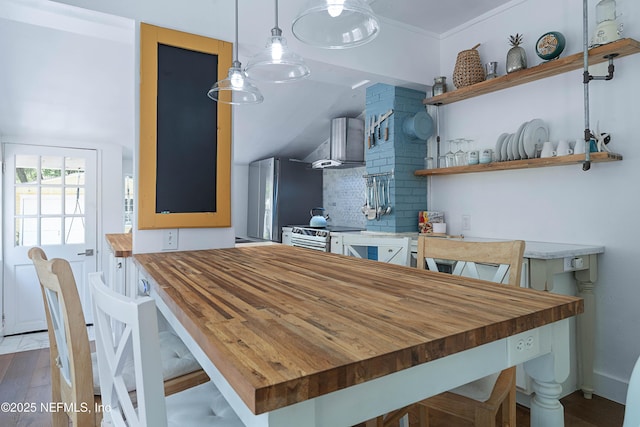 2720 Apache Ave, Jacksonville, FL 32210 - dining room featuring wood finished floors and lofted ceiling