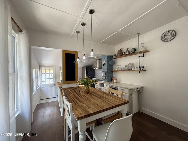 2720 Apache Ave, Jacksonville, FL 32210 - dining room featuring baseboards and dark wood-style floors