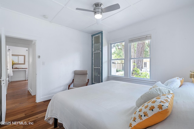 2720 Apache Ave, Jacksonville, FL 32210 - bedroom featuring a ceiling fan, baseboards, and wood finished floors