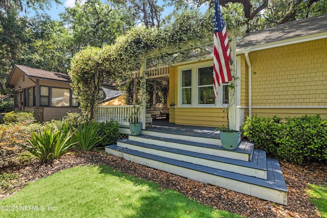 2720 Apache Ave, Jacksonville, FL 32210 - exterior space with covered porch and roof with shingles