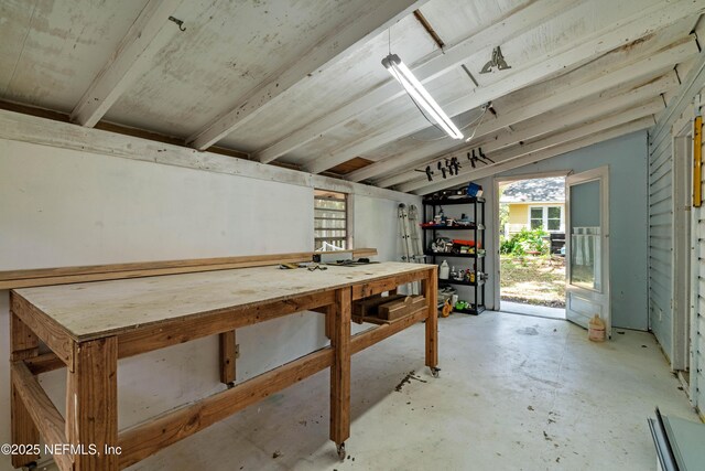 2720 Apache Ave, Jacksonville, FL 32210 - basement with a workshop area