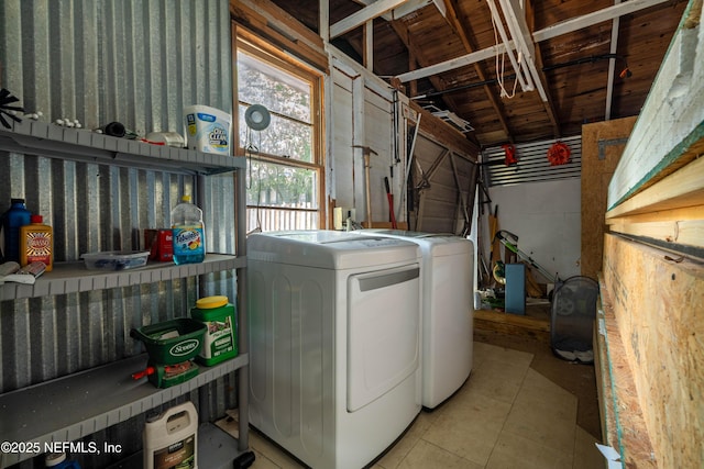 2720 Apache Ave, Jacksonville, FL 32210 - clothes washing area featuring laundry area, washer and clothes dryer, and a garage