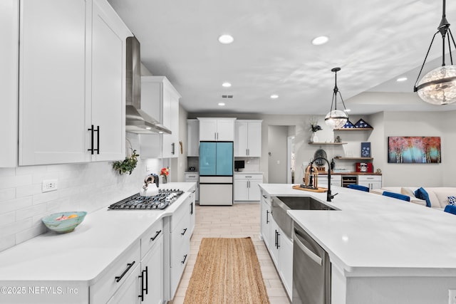 49 Golden Fern Dr, Saint Augustine, FL 32092 - kitchen with a sink, wall chimney exhaust hood, backsplash, appliances with stainless steel finishes, and recessed lighting