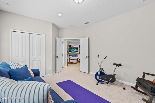 49 Golden Fern Dr, Saint Augustine, FL 32092 - workout room with light carpet, baseboards, visible vents, and recessed lighting