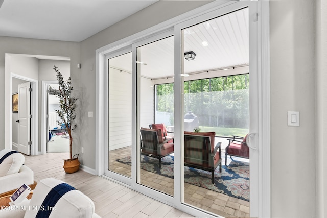 49 Golden Fern Dr, Saint Augustine, FL 32092 - doorway with wood finished floors and baseboards