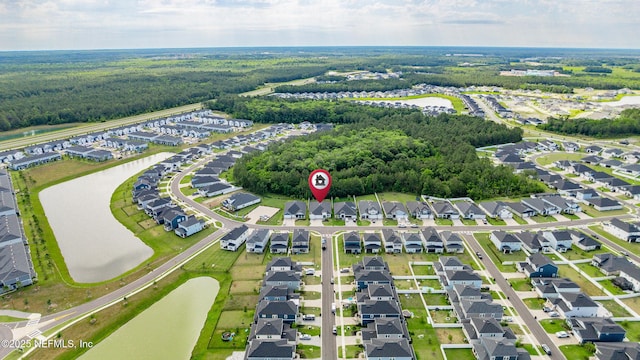 49 Golden Fern Dr, Saint Augustine, FL 32092 - view of property location with a large body of water, nearby suburban area, and a heavily wooded area