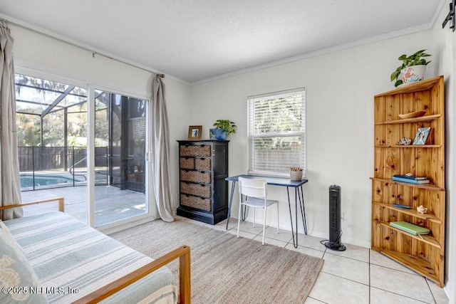 tiled bedroom with a sunroom, access to outside, and ornamental molding