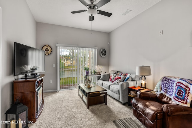 108 Brannan Pl Unit 103, Saint Johns, FL 32259 - carpeted living area featuring a ceiling fan and baseboards
