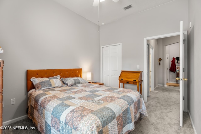 108 Brannan Pl Unit 103, Saint Johns, FL 32259 - bedroom with carpet flooring, a closet, a towering ceiling, baseboards, and ceiling fan